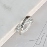 Ring with Pet Hair in Intertwined Silver Bands and Cubic Zirconia