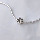 Charm with Ashes in Silver Paw Print