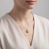 Silver Pendant with Ashes or Hair in Pet Paw Print