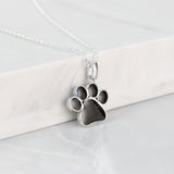 Silver Pendant with Ashes or Hair in Pet Paw Print