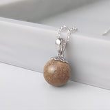 Pendant with Sand in Sphere with Silver Chain and Holder