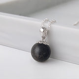 Pendant with Sand in Sphere with Silver Chain and Holder