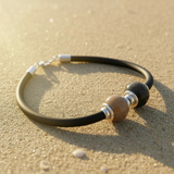 Charm Arena · Silver charms and double sphere of sand or earth