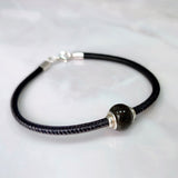 Charm with Sand · Silver Settings and Sphere with Sand or Earth