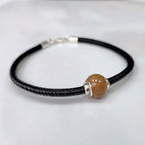 Charm with Sand · Silver Settings and Sphere with Sand or Earth