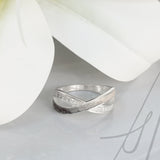 Ring with Pet Hair in Intertwined Silver Bands and Cubic Zirconia